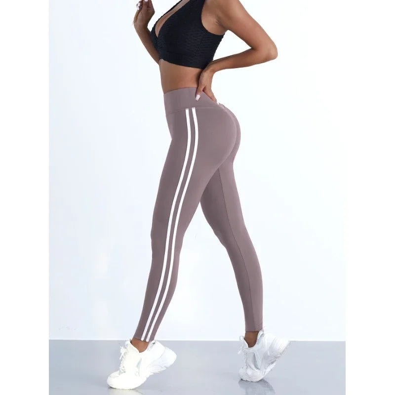 Leggings de yoga pour femmes, rayés, coupe slim, pantalon de sport taille haute, effet push-up, collant décontracté, idéal pour le sport, la course à pied et la gym.