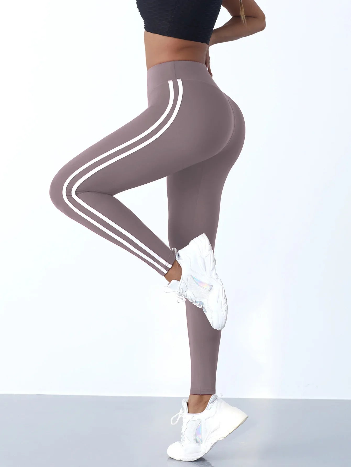 Leggings de yoga pour femmes, rayés, coupe slim, pantalon de sport taille haute, effet push-up, collant décontracté, idéal pour le sport, la course à pied et la gym.