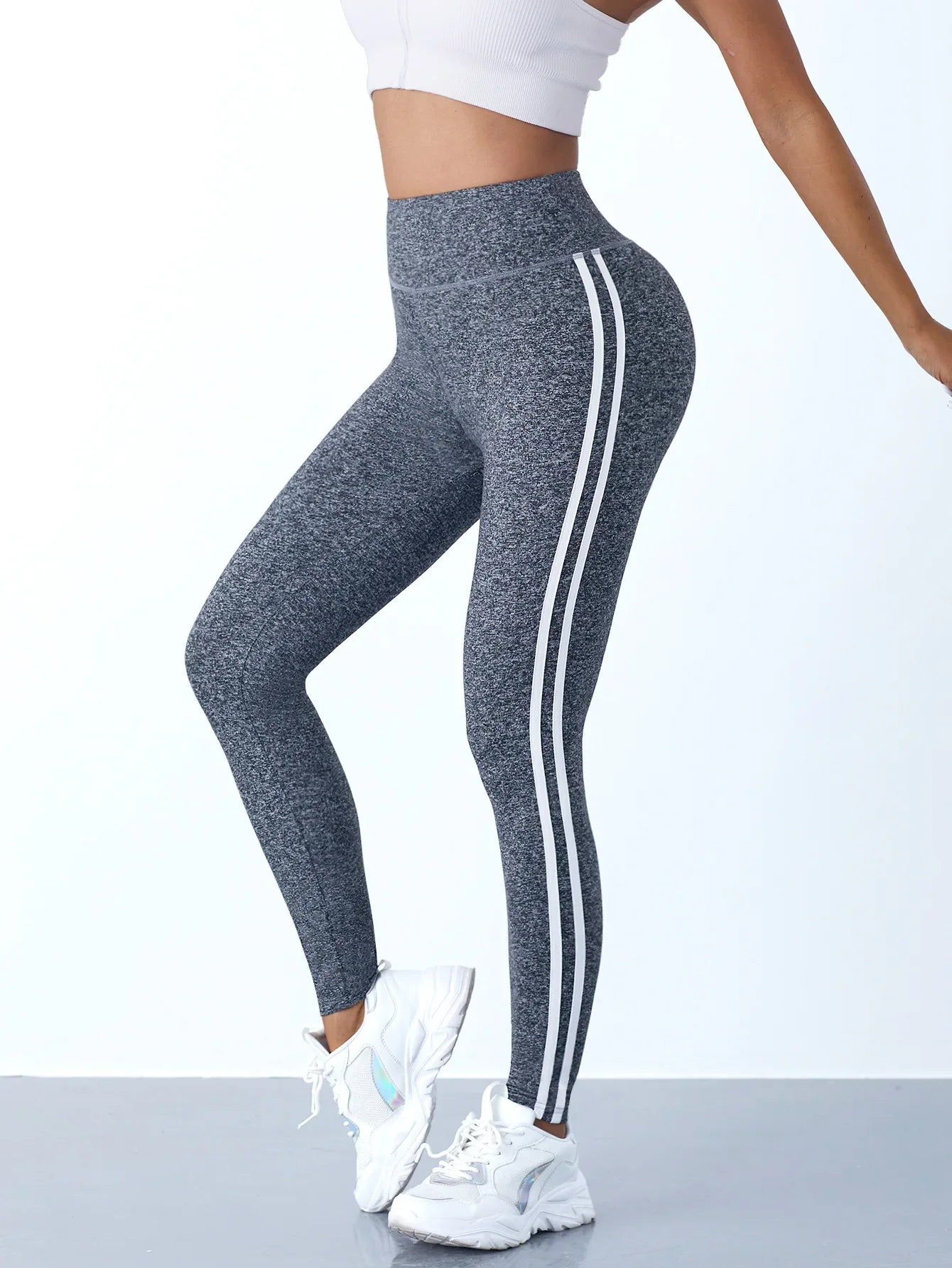 Leggings de yoga pour femmes, rayés, coupe slim, pantalon de sport taille haute, effet push-up, collant décontracté, idéal pour le sport, la course à pied et la gym.
